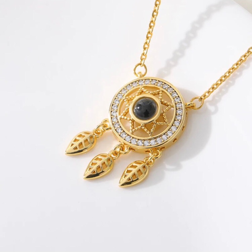 Gold dream catcher necklace